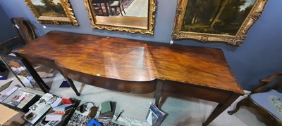 Lot 879 - George III mahogany breakfront serving table