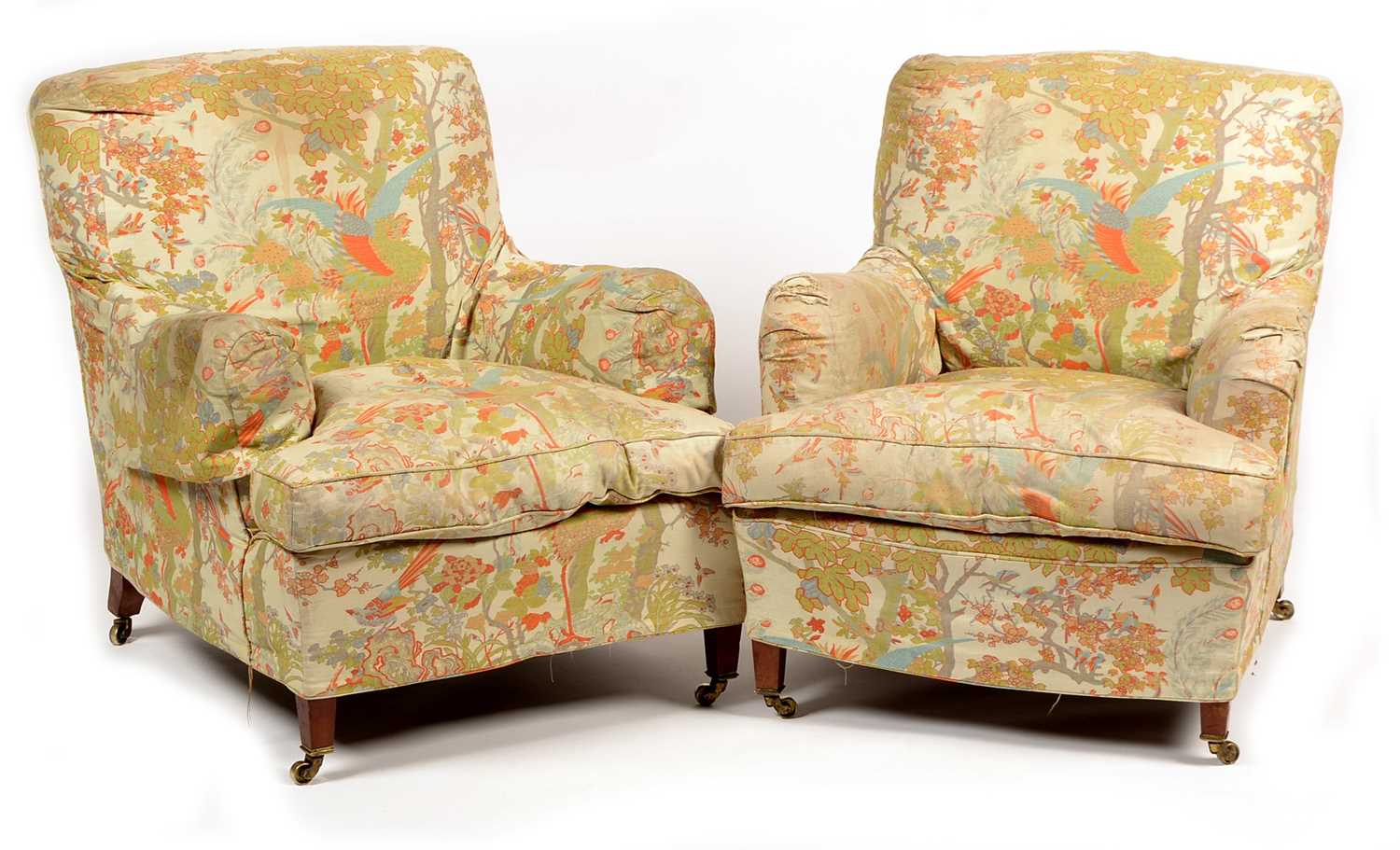 Lot 832 - A pair of Howard & Sons armchairs