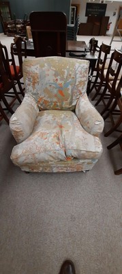 Lot 832 - A pair of Howard & Sons armchairs