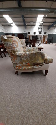 Lot 832 - A pair of Howard & Sons armchairs