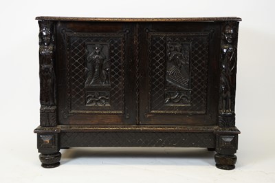 Lot 837 - A Victorian oak carved cupboard