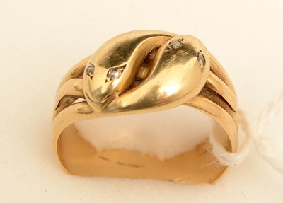 Lot 158 - A yellow metal snake pattern ring