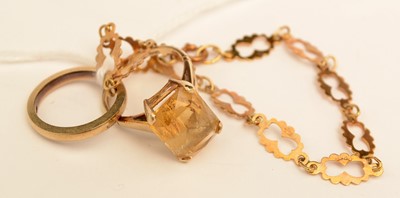 Lot 144 - Ttwo gold rings and a bracelet
