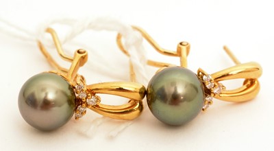Lot 87 - A pair of black cultured pearl and diamond earrings