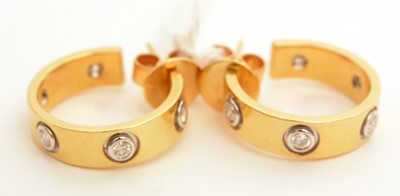 Lot 88 - A pair of 18ct yellow gold and diamond earrings