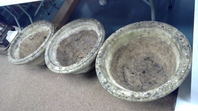 Lot 640 - Three composite stone planters
