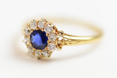 Lot 6 - Sapphire and diamond cluster ring