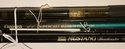 Lot 671 - Three beach fishing rods.