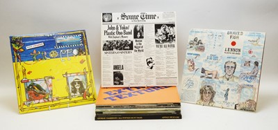 Lot 882 - John Lennon and George Harrison LPs
