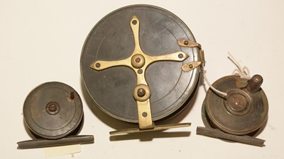 Lot 747 - Heatons reel; and two unnamed fishing reels.