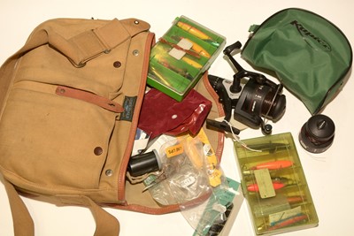 Lot 751 - Fisherman's bag and contents; and spinning reel.