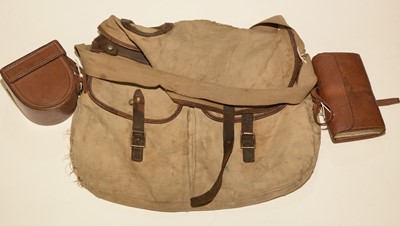 Lot 710 - A cast wallet and contents; fishing reel case; and a fishing bag.
