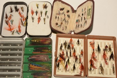 Lot 753 - Fly pouch and three boxes containing fishing tackle items.