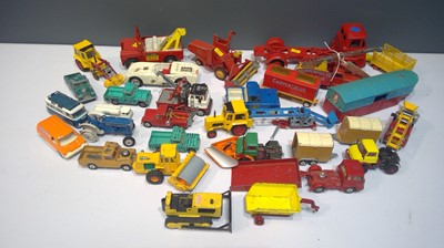 Lot 1140 - Corgi and Tri-ang diecast trucks, bulldozers, etc, unboxed.