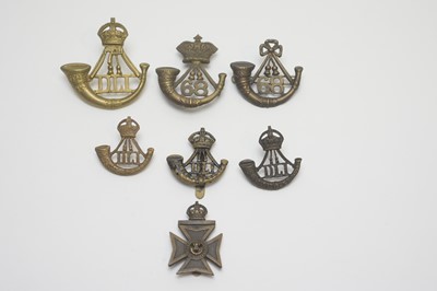 Lot 1013 - Collection of nine Durham Light infantry cap badges