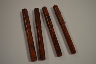 Lot 661 - Four Conway Stewart ripple cased fountain pens