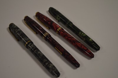 Lot 658 - Four Conway Stewart fountain pens