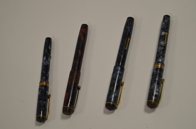 Lot 660 - Four Conway Stewart fountain pens