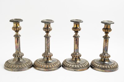Lot 94 - Four Sheffield plated candlesticks