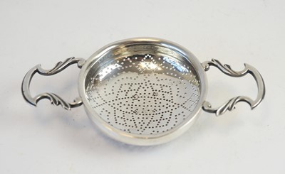 Lot 173 - George II silver lemon strainer
