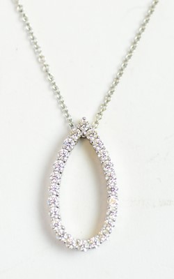 Lot 57 - A diamond pendant on chain