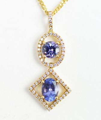 Lot 59 - A tanzanite and diamond drop pendant