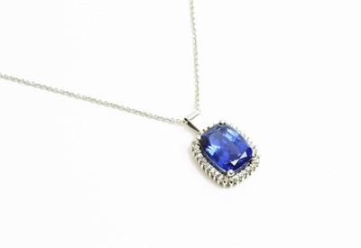 Lot 61 - Tanzanite and diamond cluster pendant