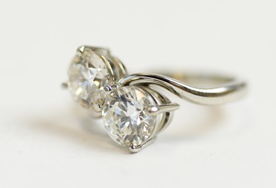 Lot 71 - A two stone diamond crossover ring