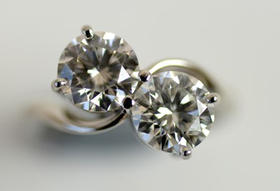 Lot 71 - A two stone diamond crossover ring