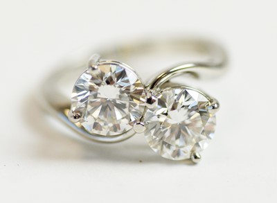 Lot 71 - A two stone diamond crossover ring