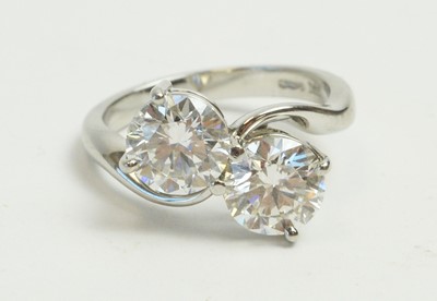 Lot 71 - A two stone diamond crossover ring