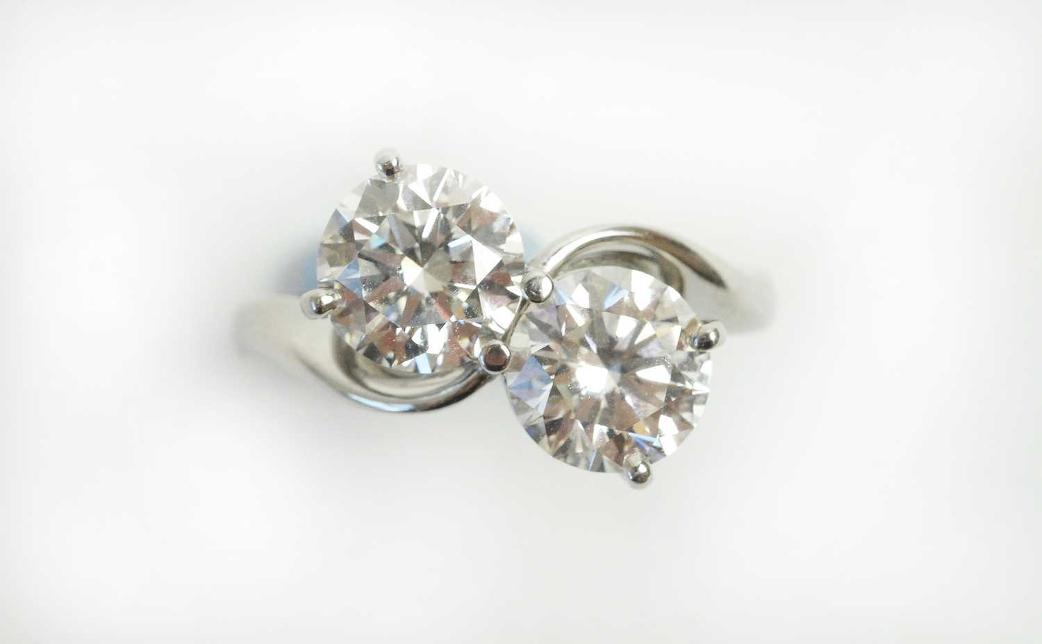 Lot 71 - A two stone diamond crossover ring