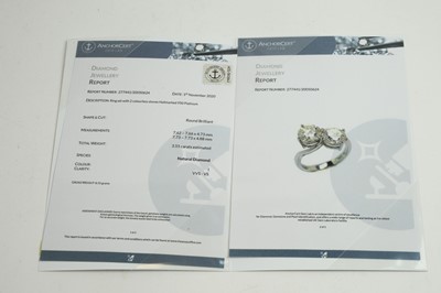 Lot 71 - A two stone diamond crossover ring