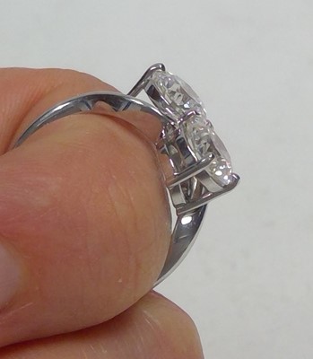 Lot 71 - A two stone diamond crossover ring