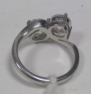 Lot 71 - A two stone diamond crossover ring