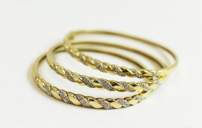 Lot 73 - Three diamonds set bangles