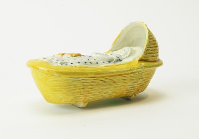Lot 612 - Pratt ware cradle