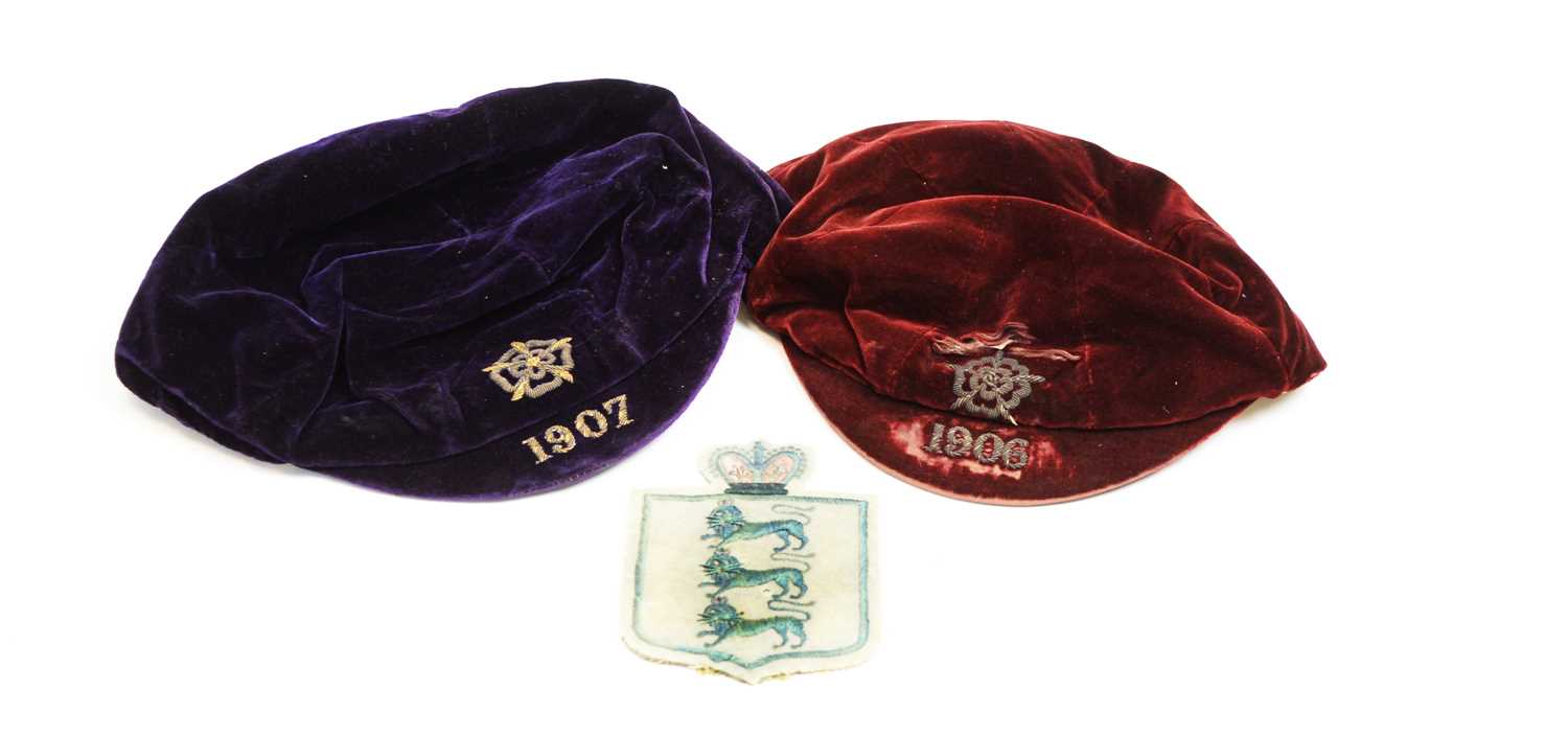 Lot 633 - Colin Veitch: two England Football Caps; and an England jersey badge.