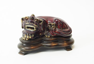 Lot 567 - Chinese Sang de Boeuf Fu dog