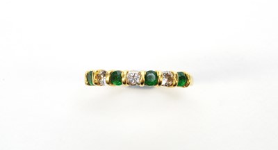 Lot 11 - Emerald and diamond ring