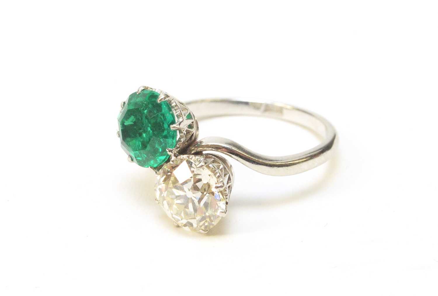 Lot 8 - A Colombian emerald and diamond ring