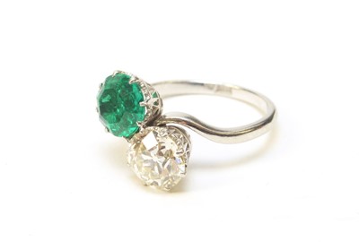 Lot 8 - A Colombian emerald and diamond ring