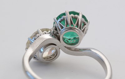 Lot 8 - A Colombian emerald and diamond ring