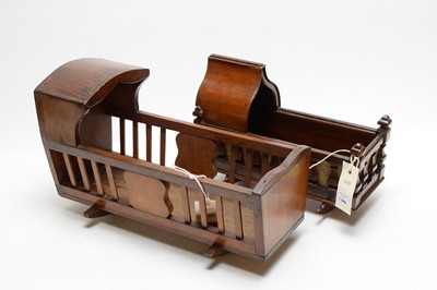 Lot 1100 - Two dolls cradles.