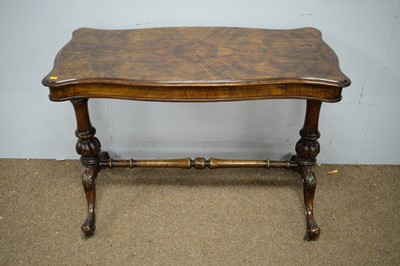 Lot 89 - A Victorian walnut reading table