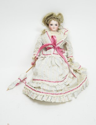 Lot 1032 - Jumeau, France: a bisque shoulder head fashion doll No. 3.