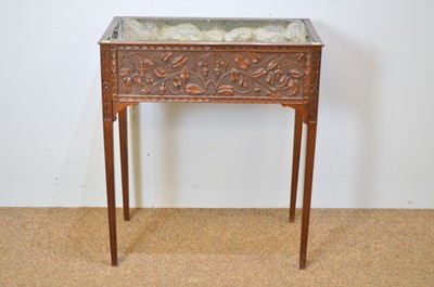 Lot 475 - Ornate oak jardiniere stand.