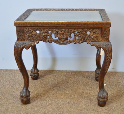 Lot 495 - Decorative carved mahogany occasional table.