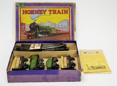 Lot 1135 - A Hornby M0 clockwork passenger train set.