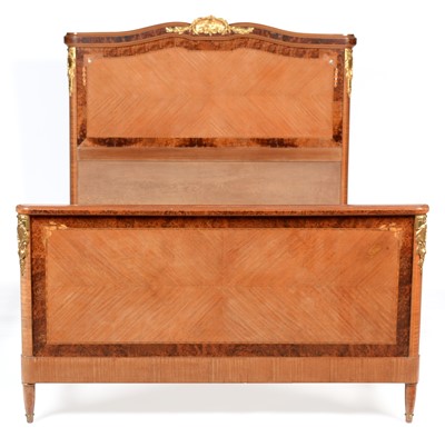 Lot 80 - Louis XVI style inlaid mahogany and amboyna double bed.